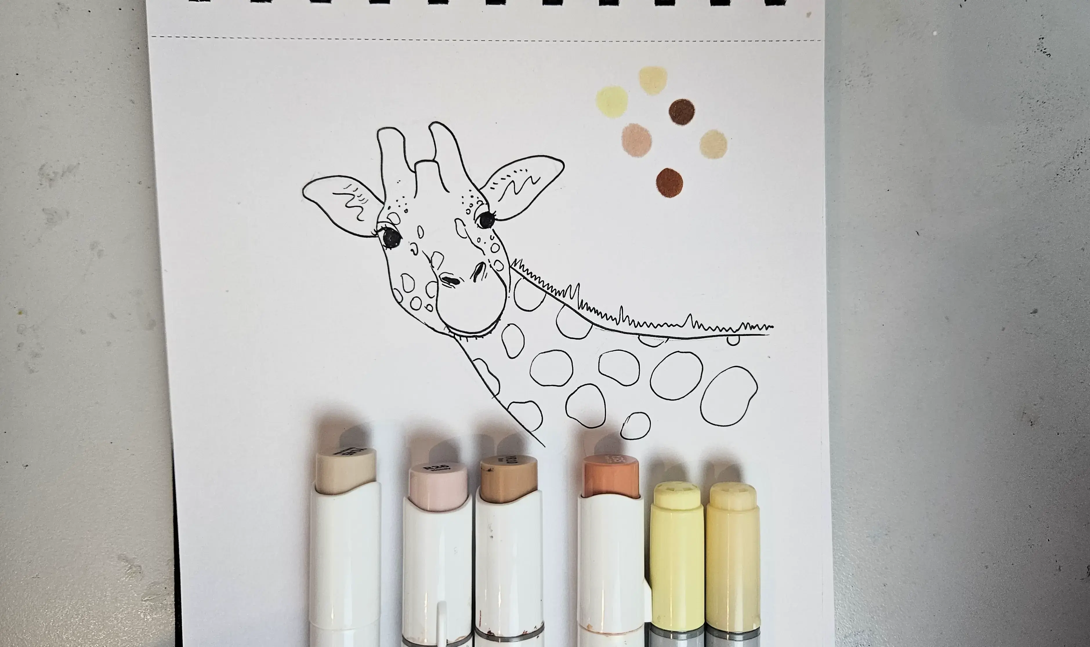 image of the colors chosen for drawing a giraffe with alcohol markers