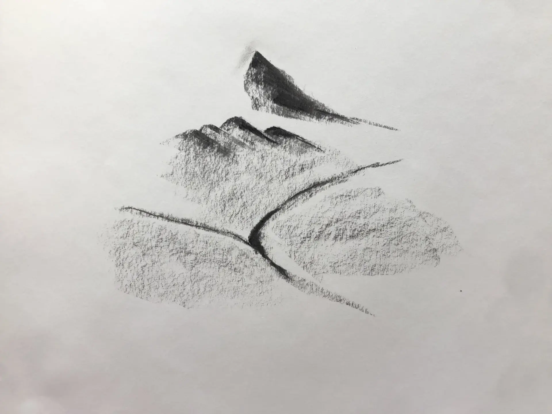 draw the shadows of a landscape in charcoal