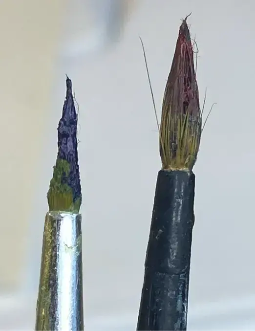 image of paintbrushes that haven't been taken care of