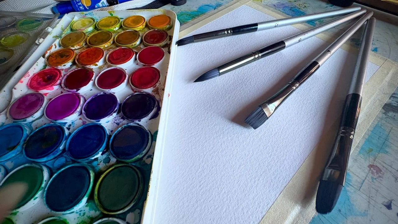 le matériel pour peindre un coucher de soleil à l’aquarelle