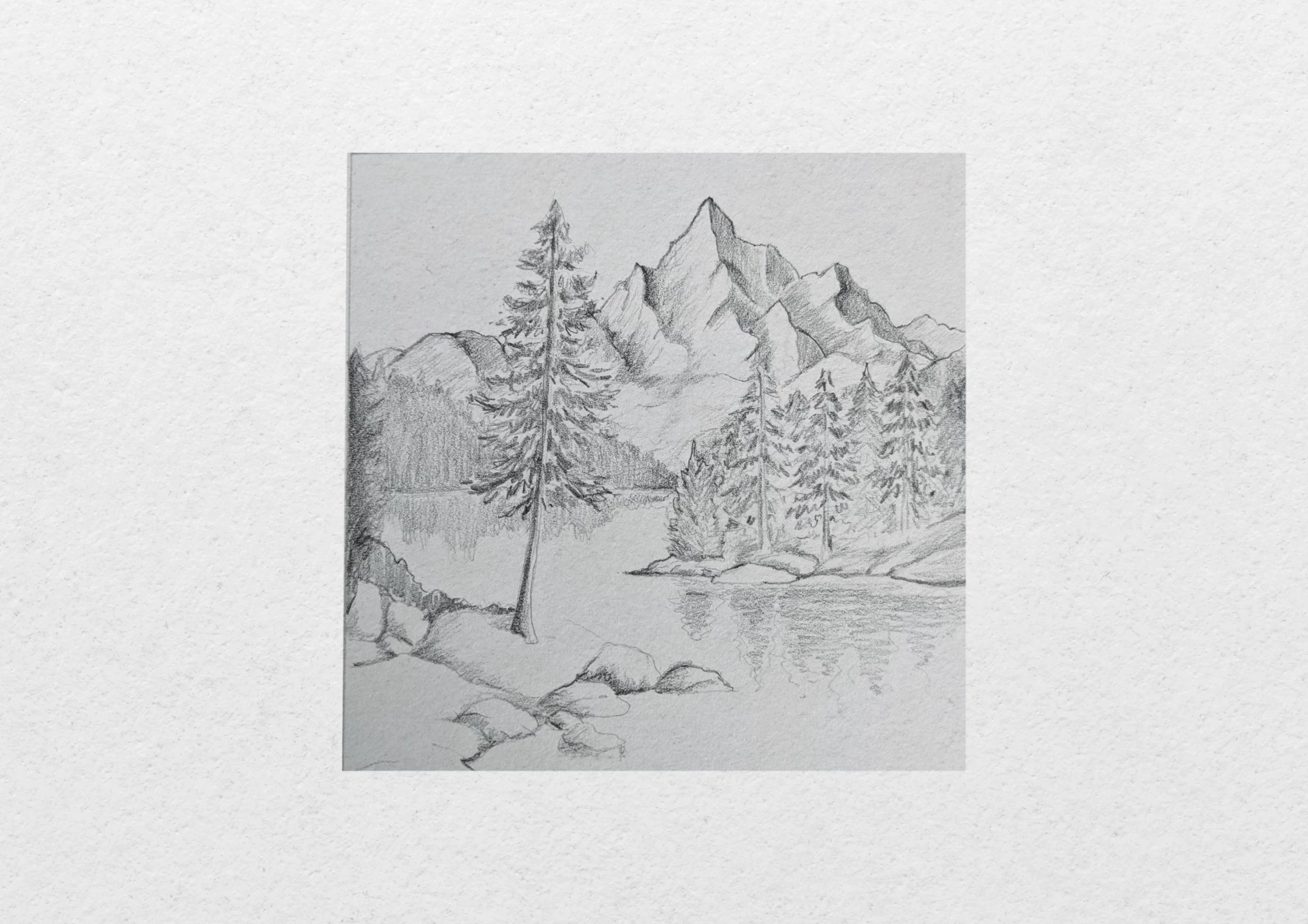 draw the reflections of a lake surrounded by mountains