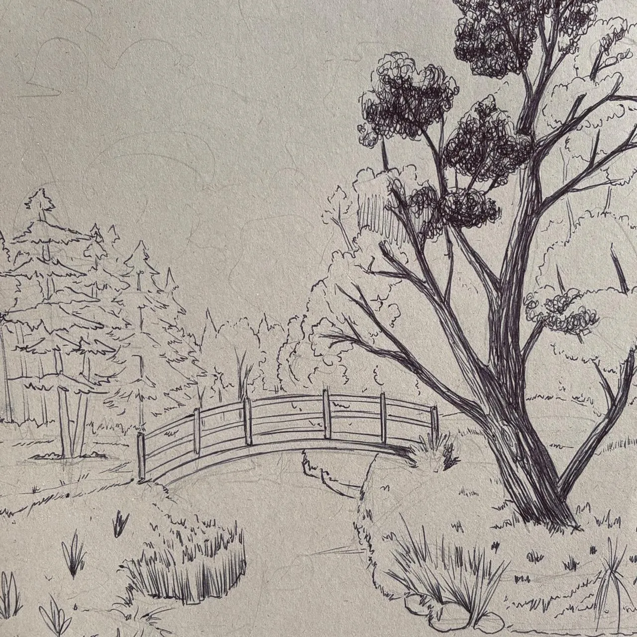 dessiner les branches d’un arbre dans un paysage au stylo