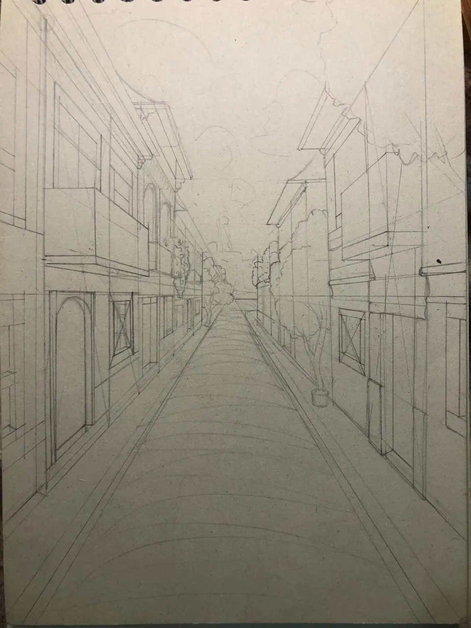 dessiner des maisons différentes dans une rue en perspective
