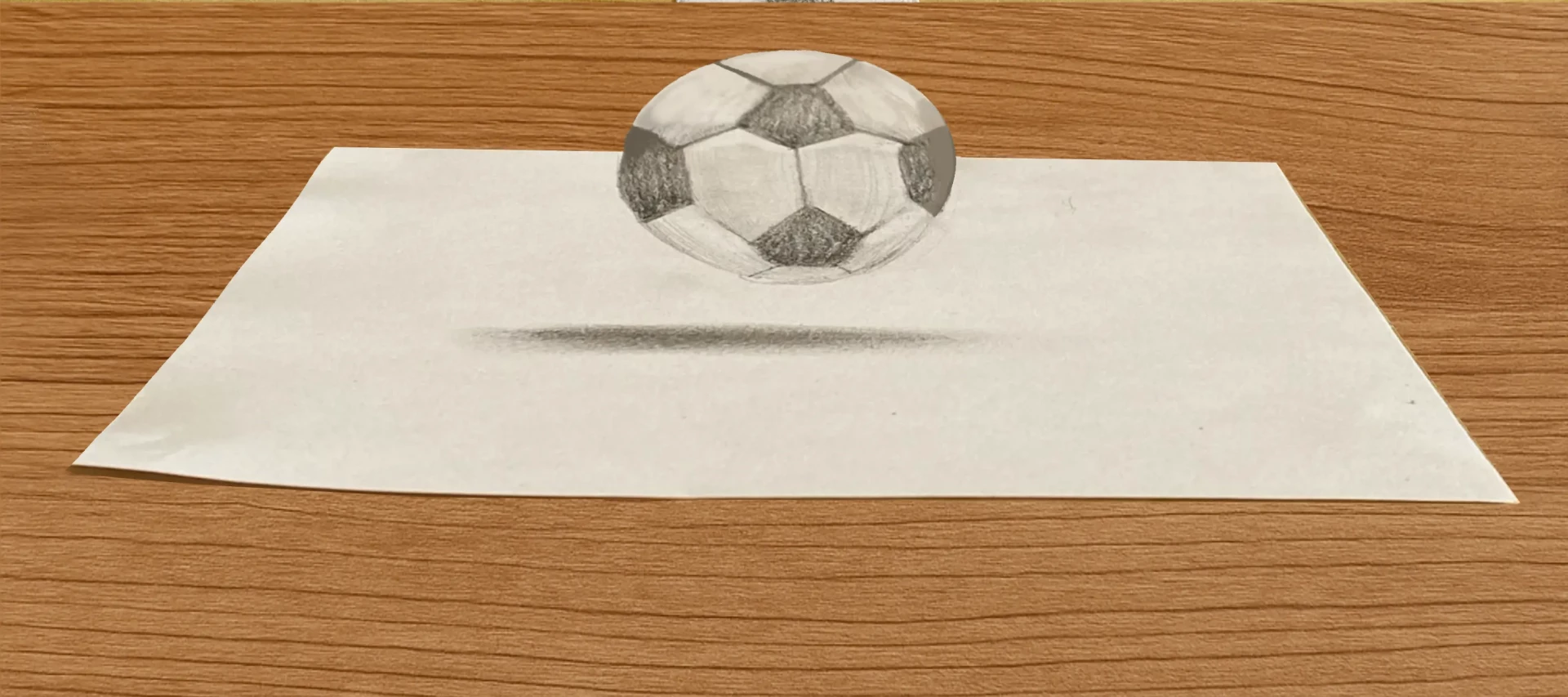 dessin en trompe-l’œil en découpant une feuille